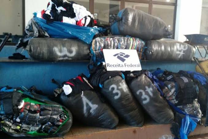 Justiça Federal condena duas pessoas por importação de roupas falsificadas
